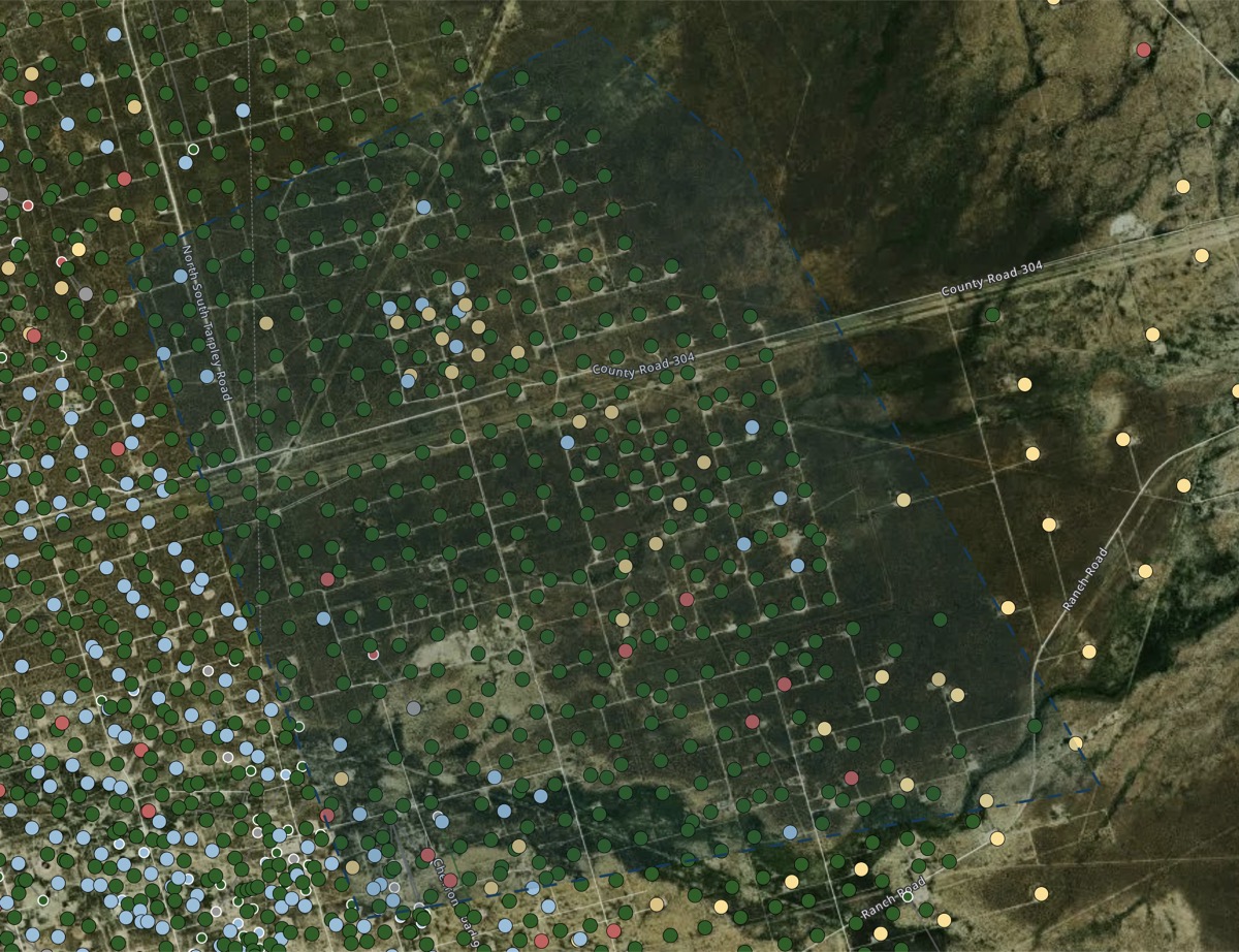 Wells Intelligence: satellite view with color-coded well locations